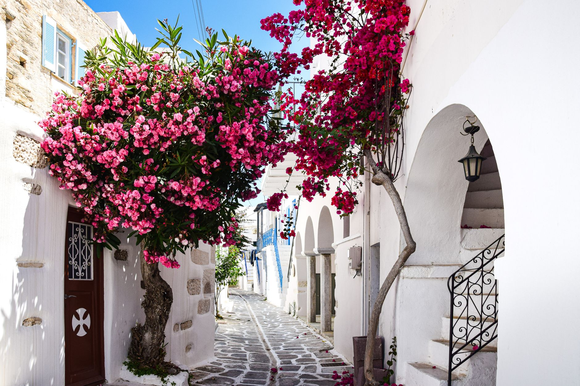 narrow alley in town in greece in spring